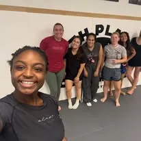 Smiling selfie of the women’s Jiu-Jitsu group at 10th Planet Columbus